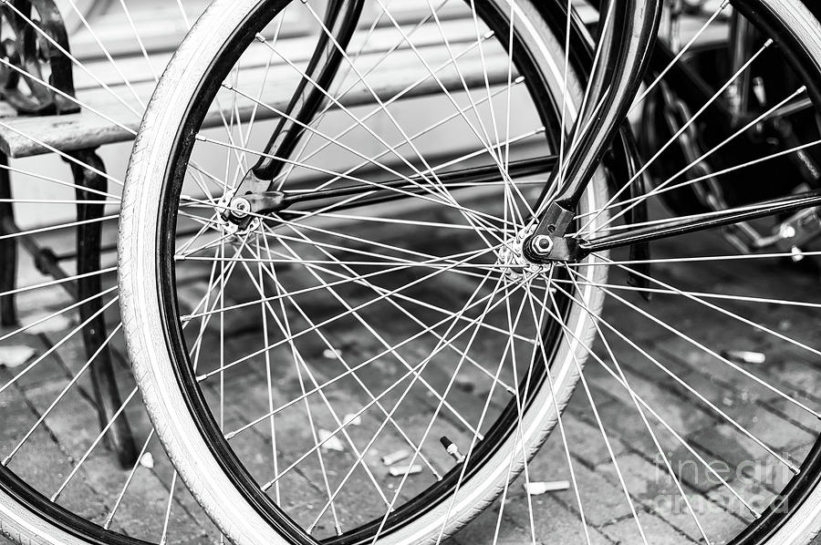 Bicycle Spokes in Amsterdam Photograph by John Rizzuto