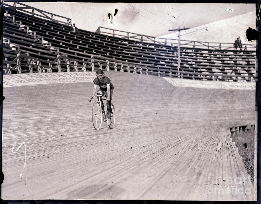 Bicyclist Riding Bike On Track Photograph by Bettmann