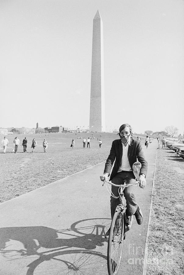 Bicyclist Wearing Gas Mask On Earth Day Photograph by Bettmann