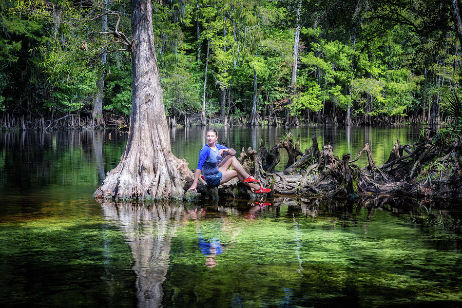 Big Cypress and Florida Spring with a person Photograph by Alex Mironyuk
