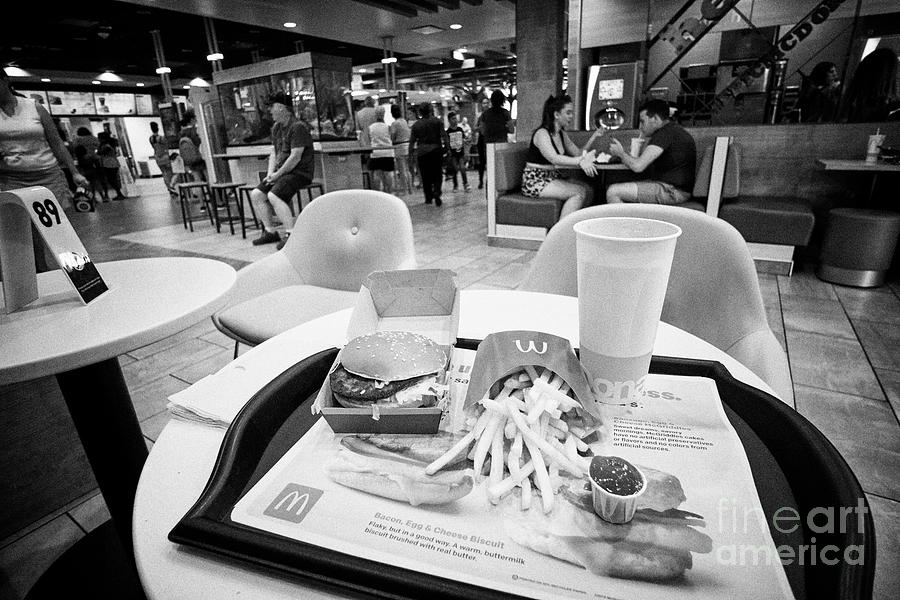 Orlando Photograph - Big Mac meal in the worlds largest entertainment McDonalds restaurant on international drive Orlando by Joe Fox