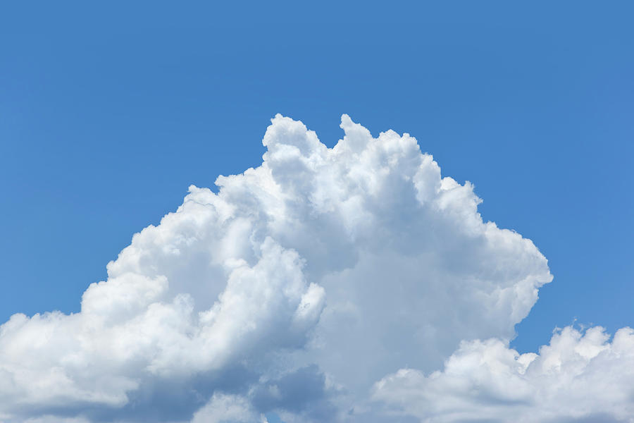 Big White Cumulus Cloud With Blue Sky Photograph by Grafissimo