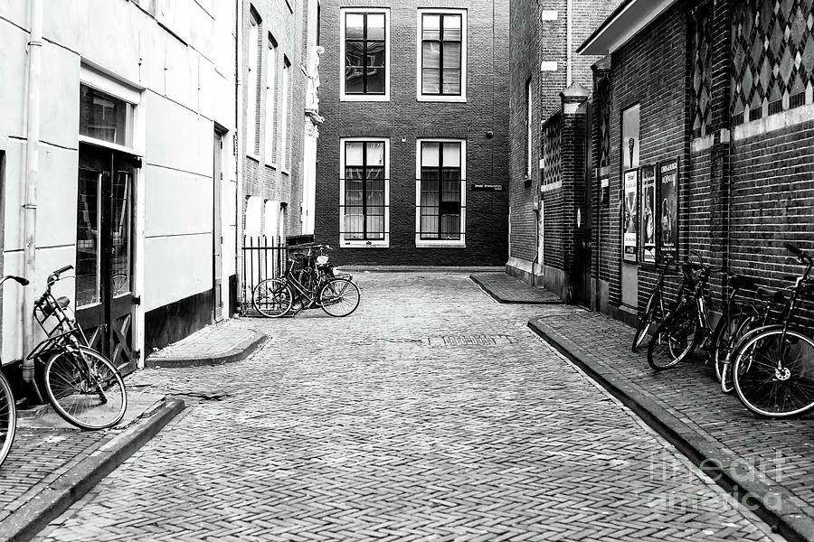 City Photograph - Bike Alley in Amsterdam by John Rizzuto