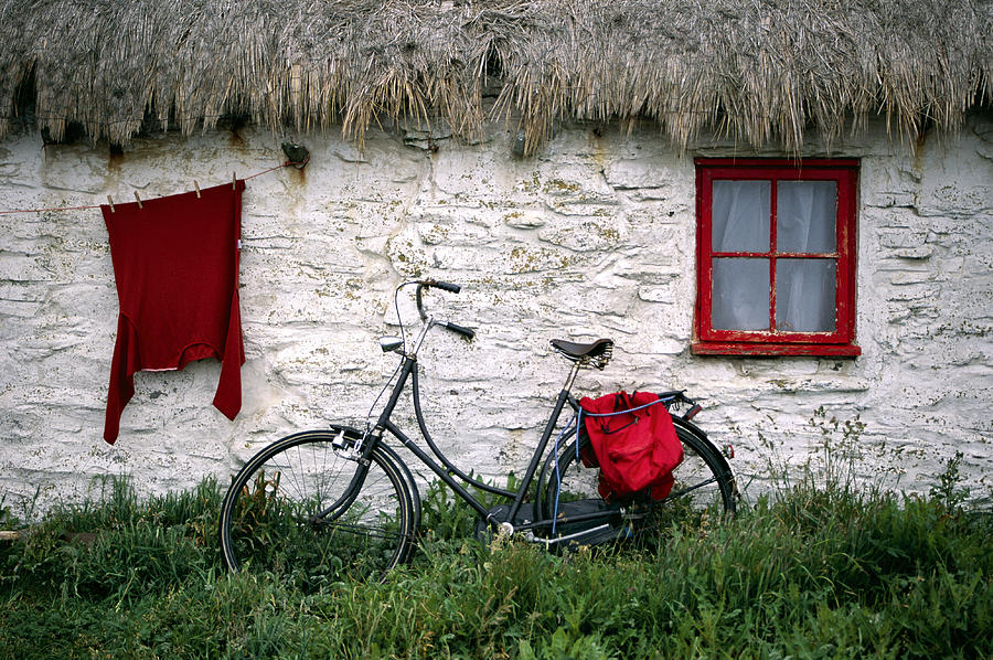 Bike In Front Of Cottage, Isle Of Man Photograph by Brand X Pictures