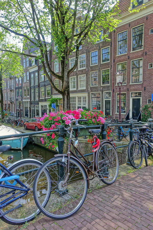Bikes, Flowers and Canal Homes Photograph by Patricia Caron