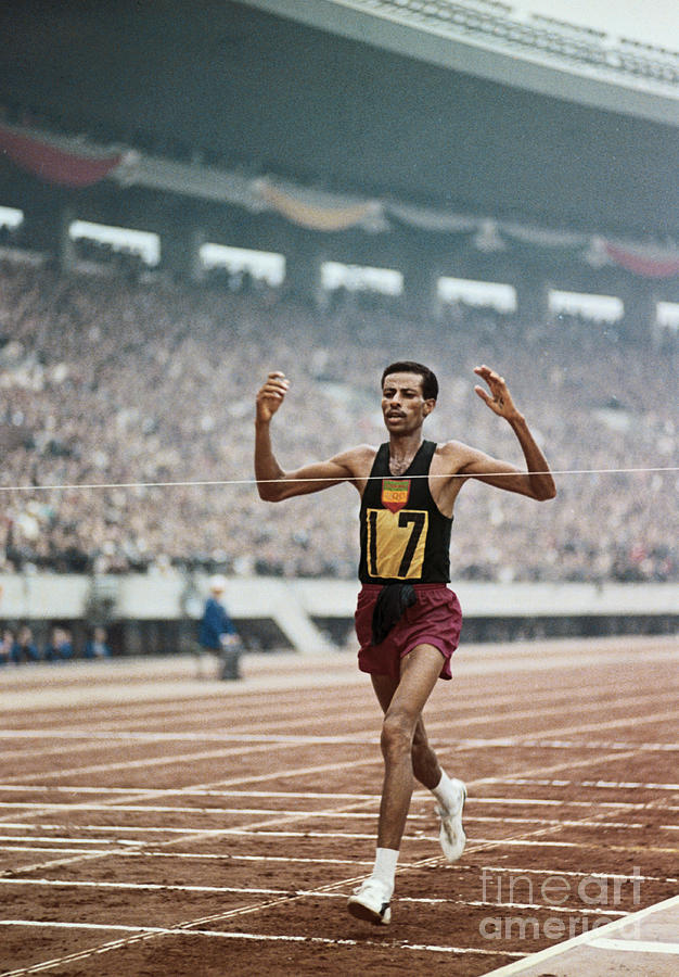 Bikila Abebe Winning Second Olympic Photograph by Bettmann