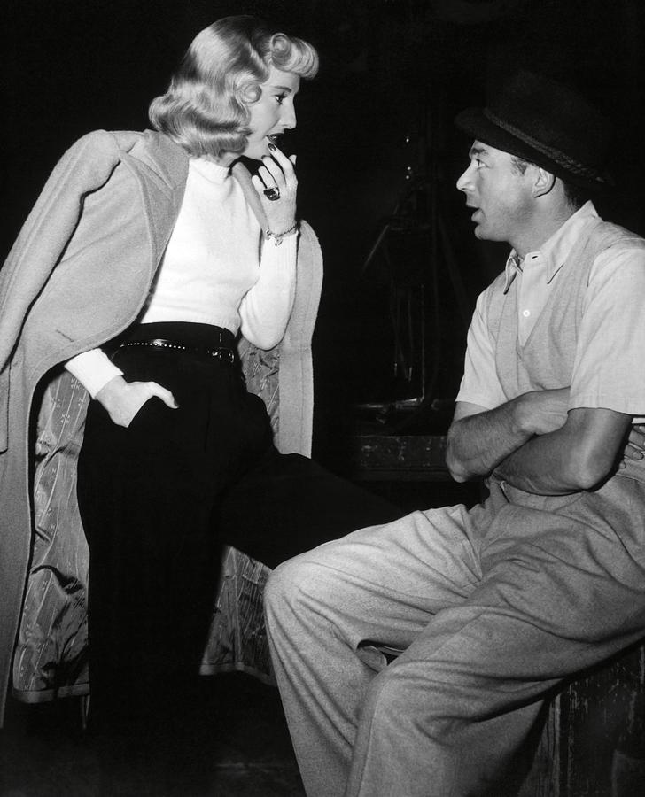 BILLY WILDER and BARBARA STANWYCK in DOUBLE INDEMNITY -1944-. Photograph by Album