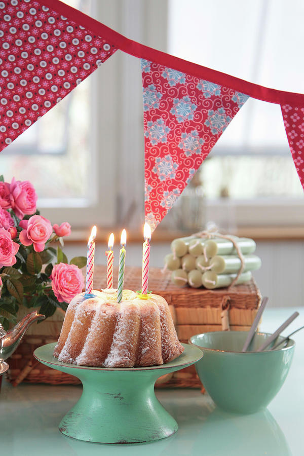 Birthday Table With Cake With Candles, Garland And Roses Photograph by Sonja Zelano
