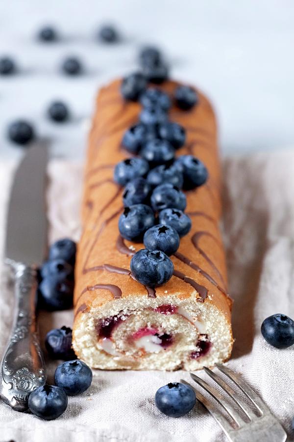 Biscuit Roulade With Blueberries And Vanilla Cream Photograph by Sonya Baby