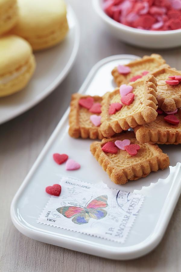 Biscuits On Serving Dish Decorated With Postage Stamps Photograph by Franziska Taube