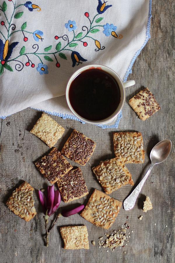 Biscuits With Flax Seeds, Sunflower Seeds And Sesame Seeds Served With A Cup Of Coffee Photograph by Sylvia E.k Photography