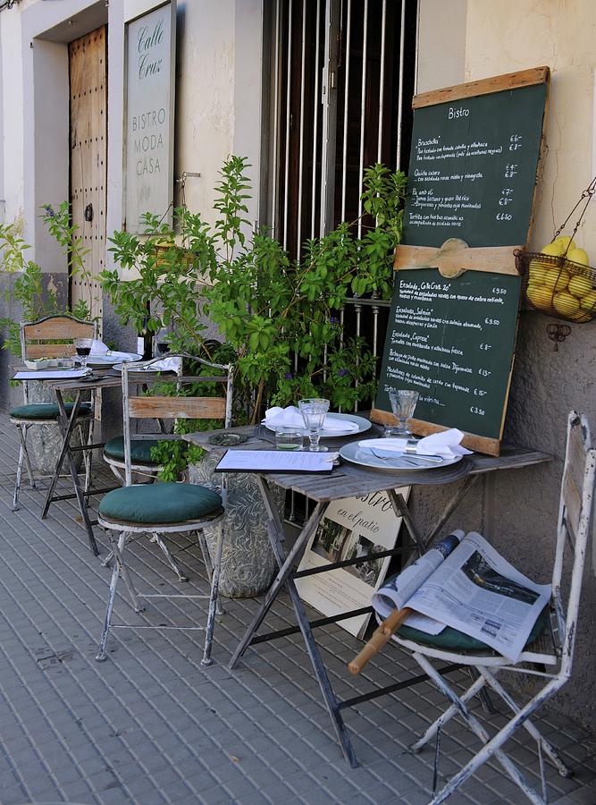 Bistro Tables Laid Outside A Cafe Photograph by Twins
