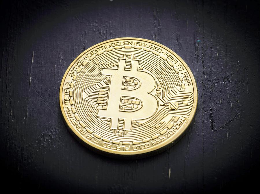 Bitcoin on black background Photograph by Bruce Matczak co-op