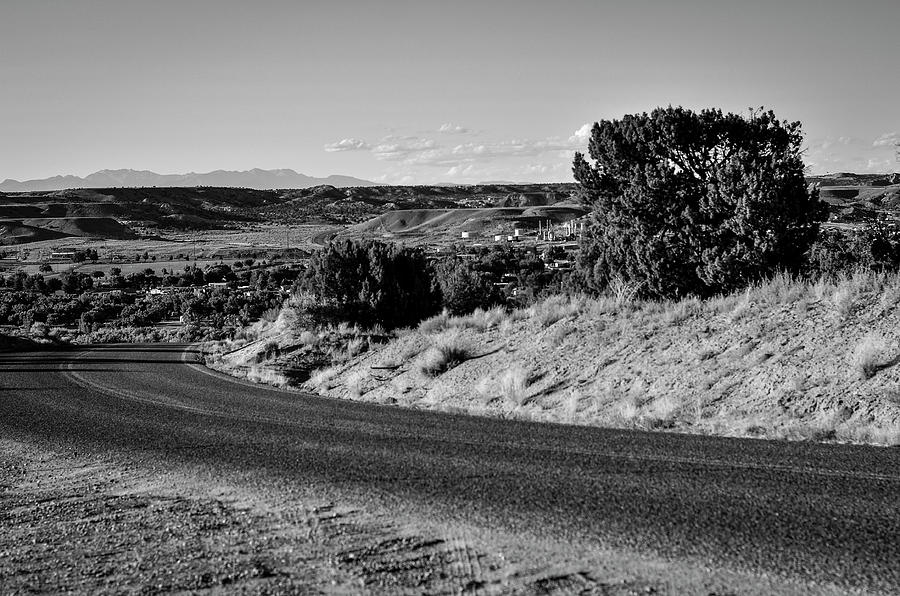 Black And White Desert Road Looking At Sleeping Ute Mountain Photograph