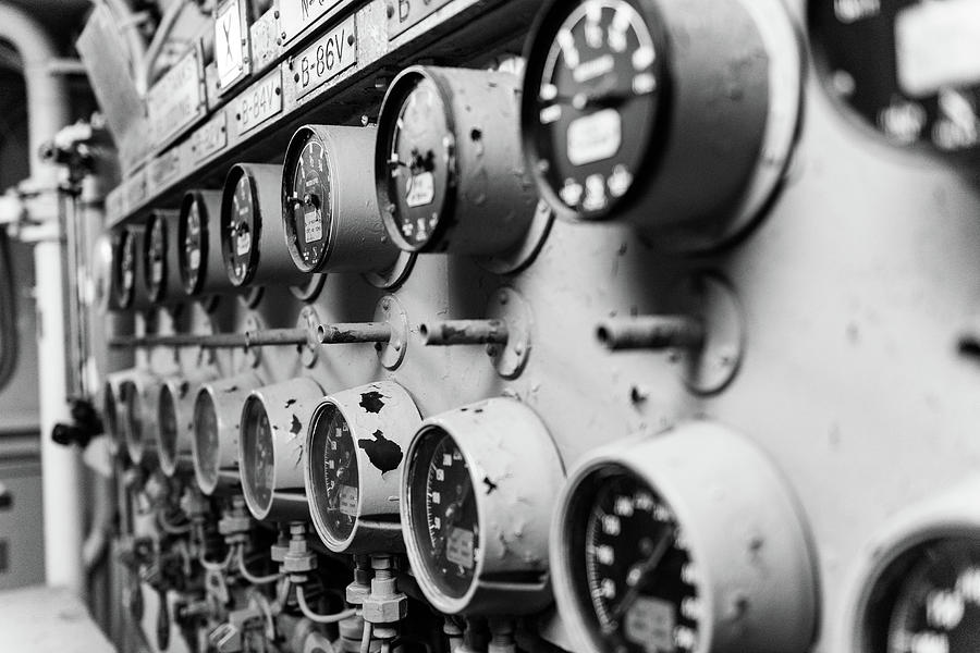 Black and White Instrument gauges aboard an aircraft carrier Photograph by Tammy Ray