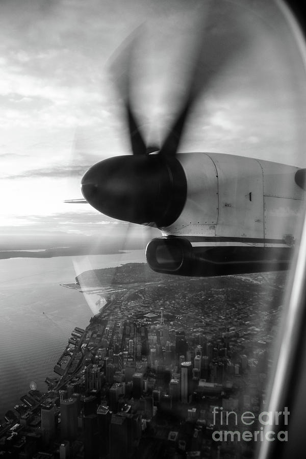 Black And White Photograph - Black and White Look Down at Downtown Seattle From A Q400 by Joe Kunzler
