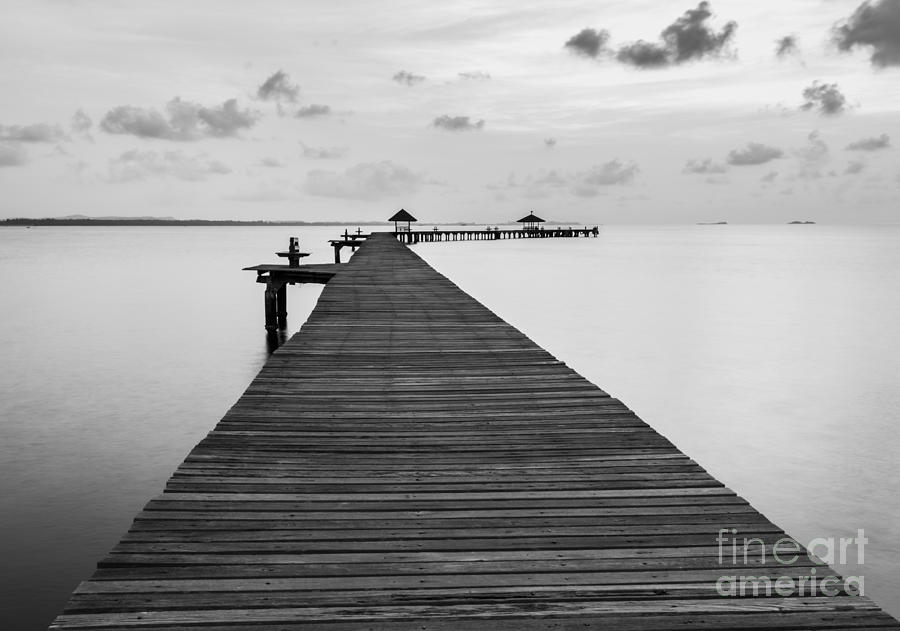 Love Photograph - Black And White Of Bridge On Beach In by Wassana Mathipikhai Love Photograph - Black And White Of Bridge On Beach In by Wassana Mathipikhai