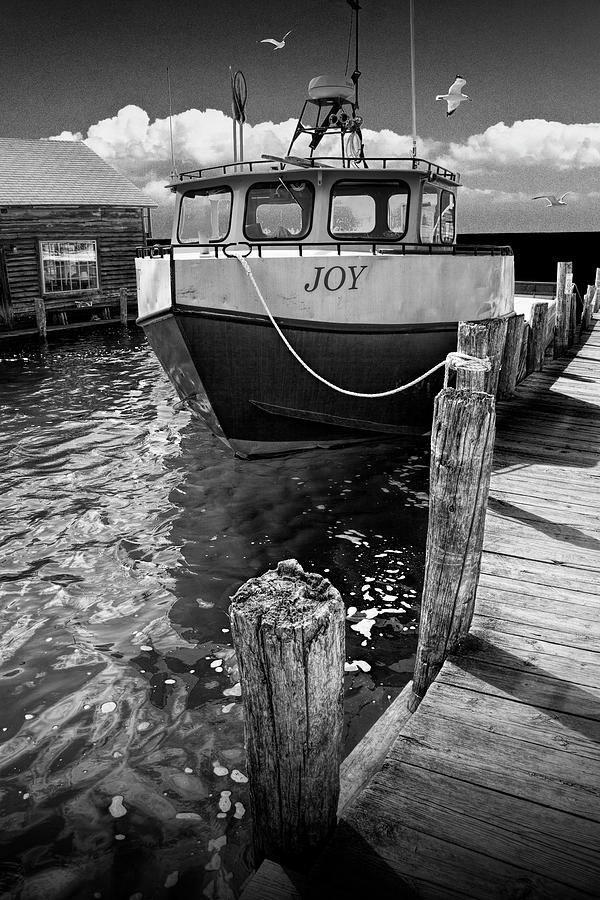Black and White Photograph of the Boat Joy at Fishtown in Leland Photograph by Randall Nyhof