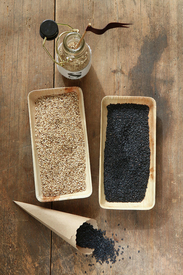 Black And White Sesame Seeds In Rectangular Bamboo Containers Photograph by Regina Hippel