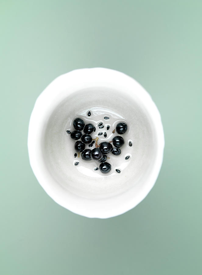 Black Berries And Black Sesame Seeds In Syrup Photograph by Cabanes-valle