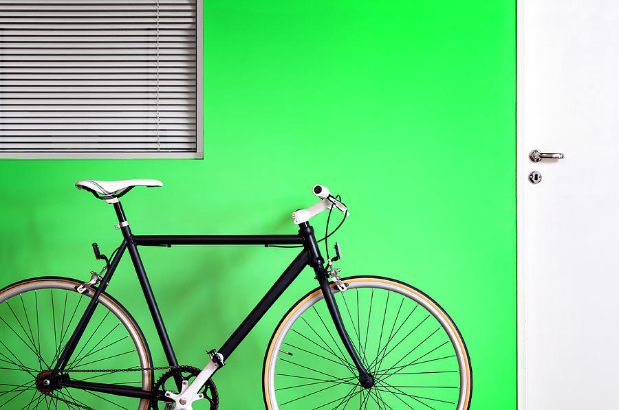 Black Bicycle Green Wall Photograph by Carlosalvarez