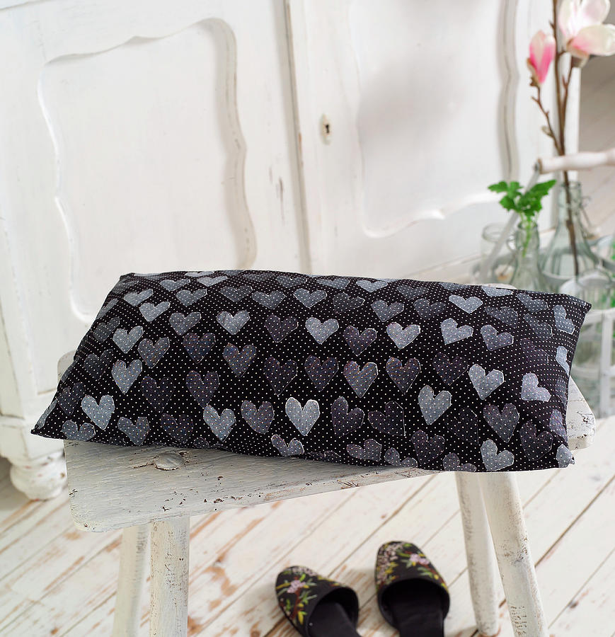 Potato Photograph - Black Cushion With White Polka-dots And Stamped Pattern Of Hearts by Flowers & Green