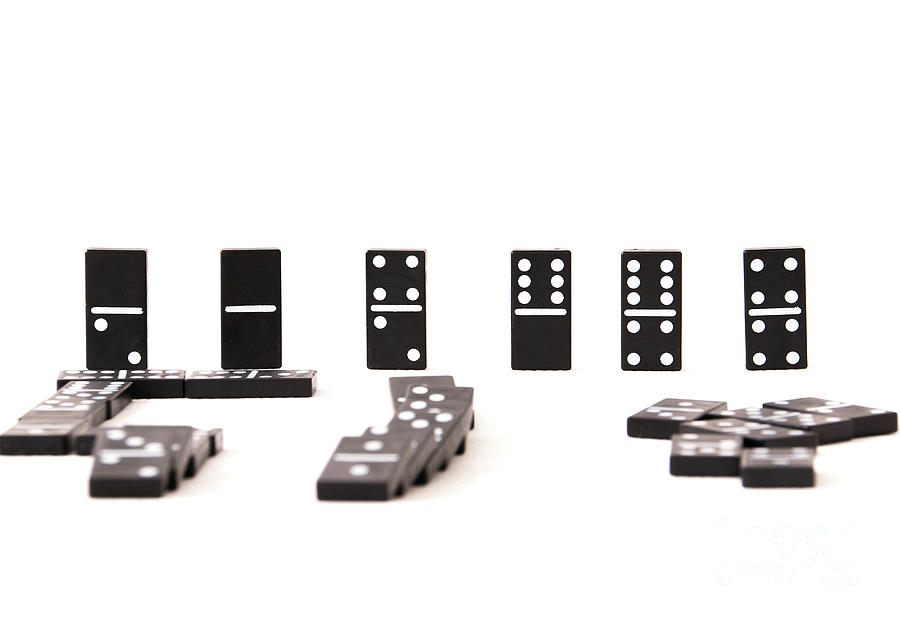 Black domino tiles on white background Photograph by Bridget Mejer