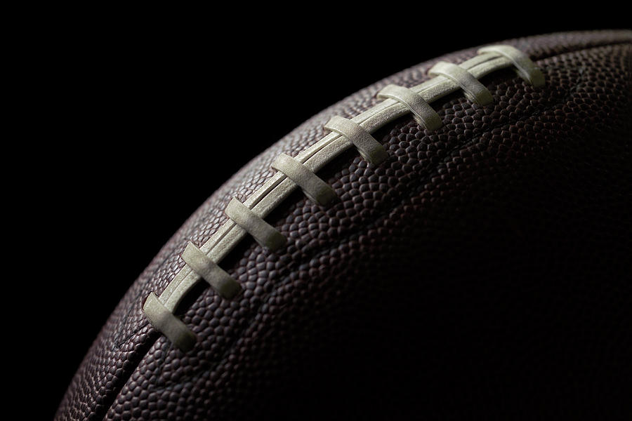 Black Football On A Black Background Photograph by Gregchristman