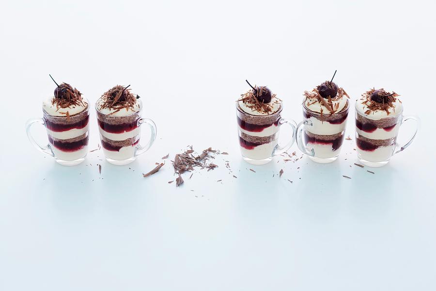 Black Forest Gateaux Style Tiramisu In Glasses Photograph by Michael Wissing