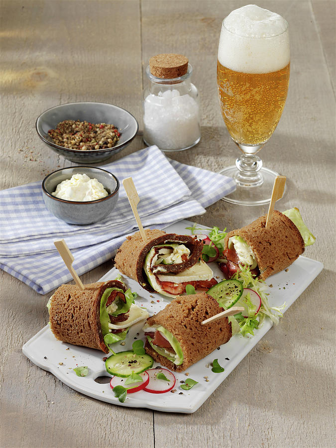 Black Forest Rolls With Camembert, Pointed Cabbage And Ham Photograph by Stockfood Studios / Photoart