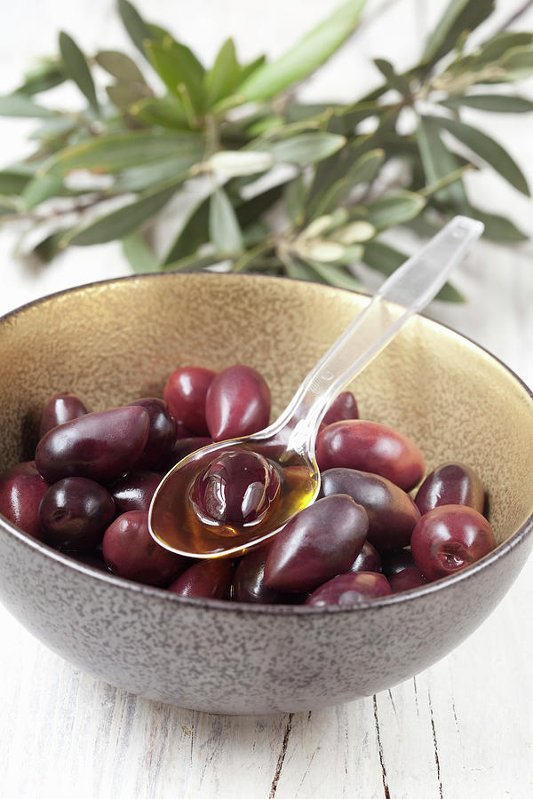Black Kalamata Olives In Small Bowls Photograph by Hilde Mche