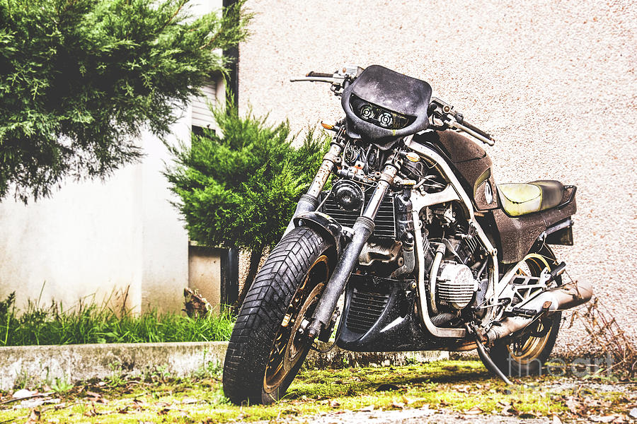 Black Motorcycle Parked Urban Background Photograph by Luca Lorenzelli