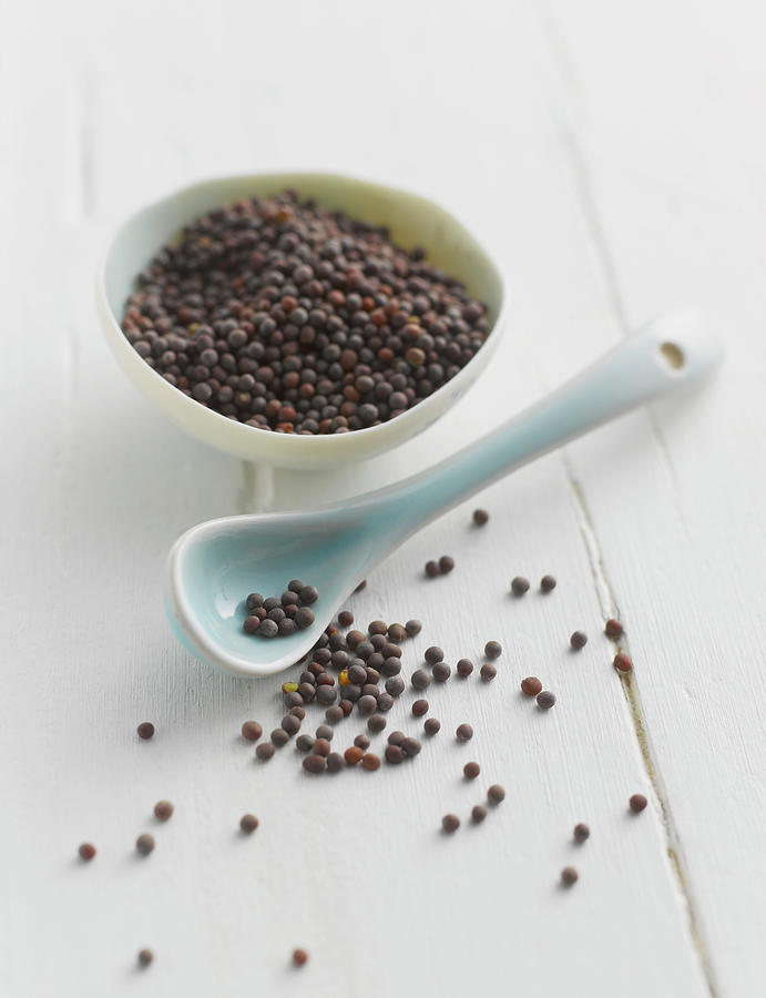 Black Mustard Seeds In Bowl With Spoon Photograph by Westend61
