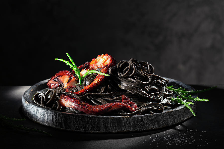 Black Pasta With Octopus Photograph by Christian Schuster