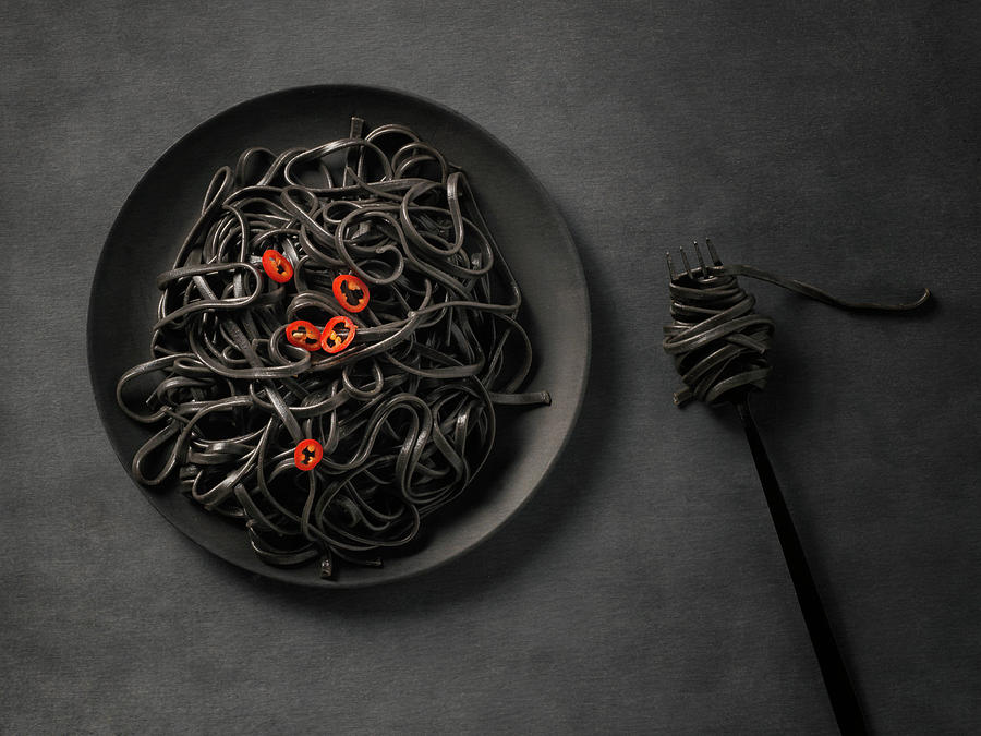 Black Pasta With Red Pepper Photograph by Studio-344