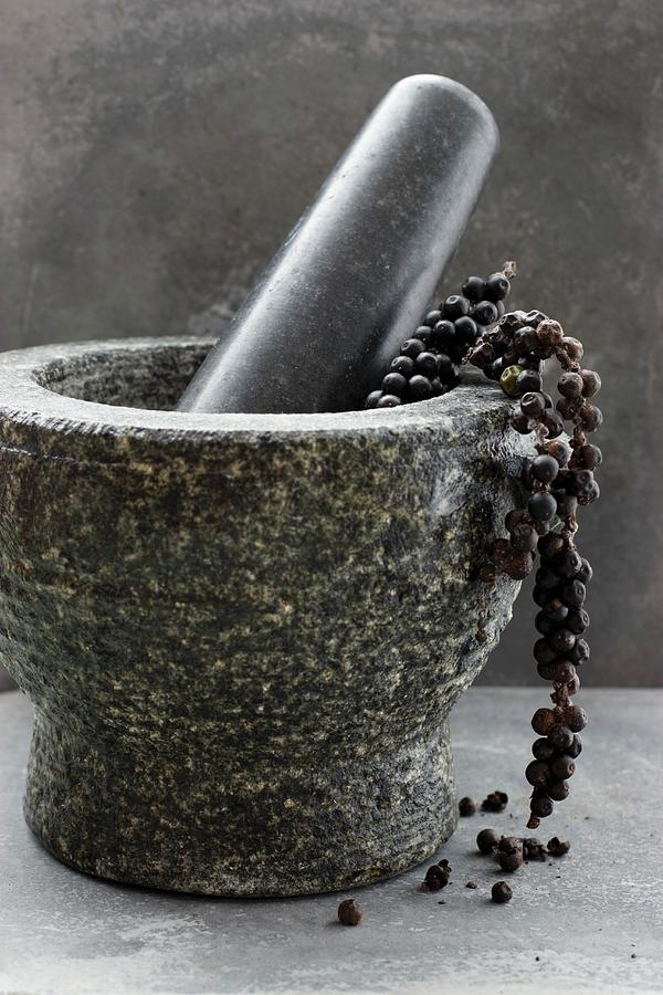Black Pepper In A Mortar Photograph by Petr Gross