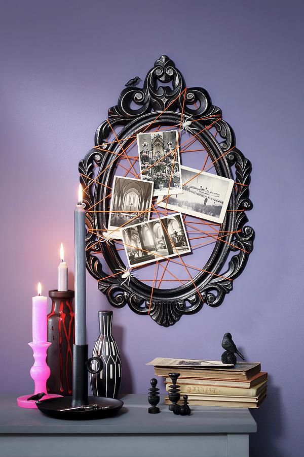 Black Picture Frame Decorated With Spider-web Arrangement For Halloween Photograph by Thordis Rggeberg