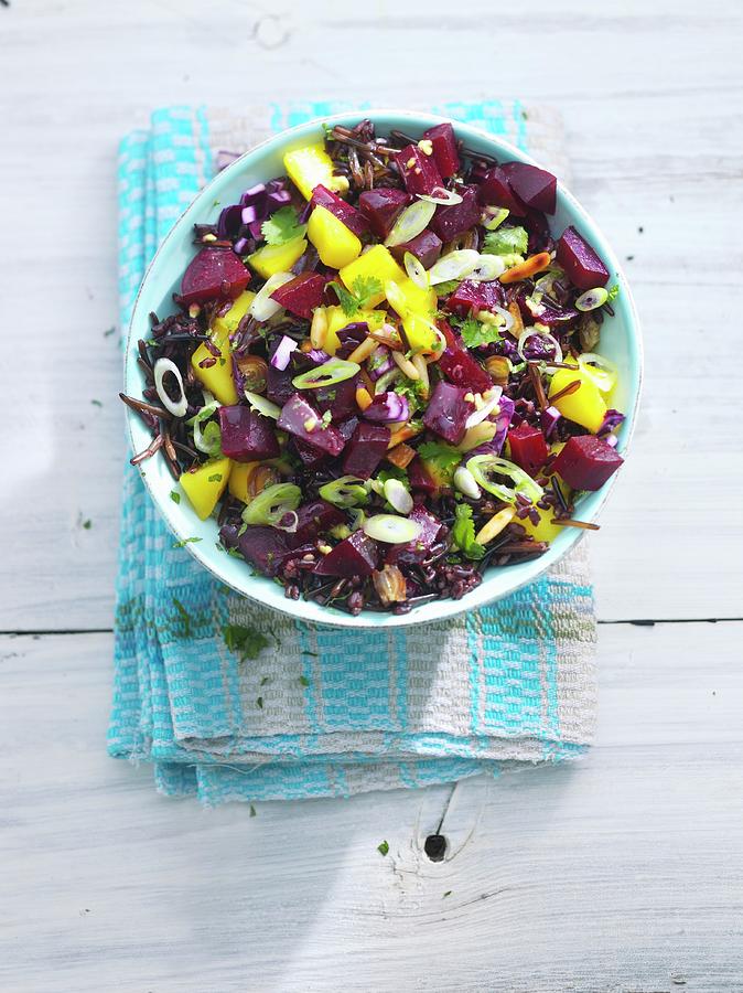 Black Rice Salad With Beetroot And Spring Onions Photograph by Linda Sonntag