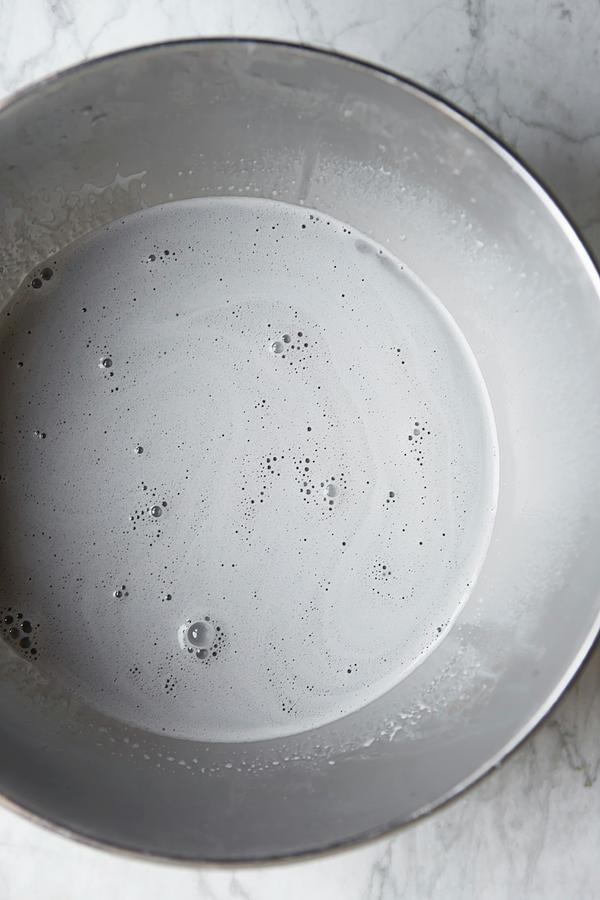 Black Sesame Milk In A Stainless Steel Bowl Photograph by Rocio Stella Graves Garcia-gutierrez