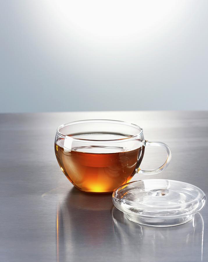 Black Tea In A Glass Teacup Photograph by Achmann, Andreas