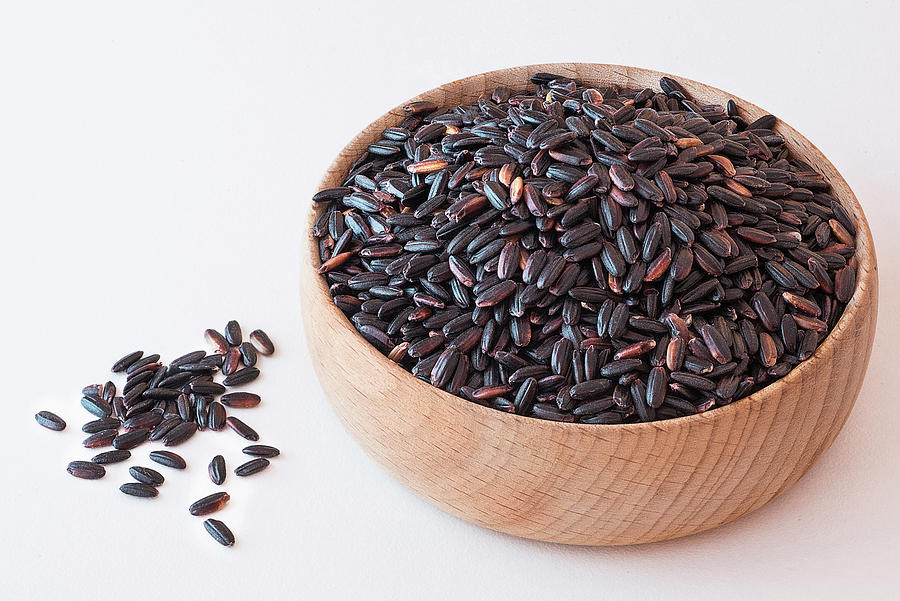 Black Venere Rice In A Wooden Bowl On Photograph by Piga & Catalano S.n.c.