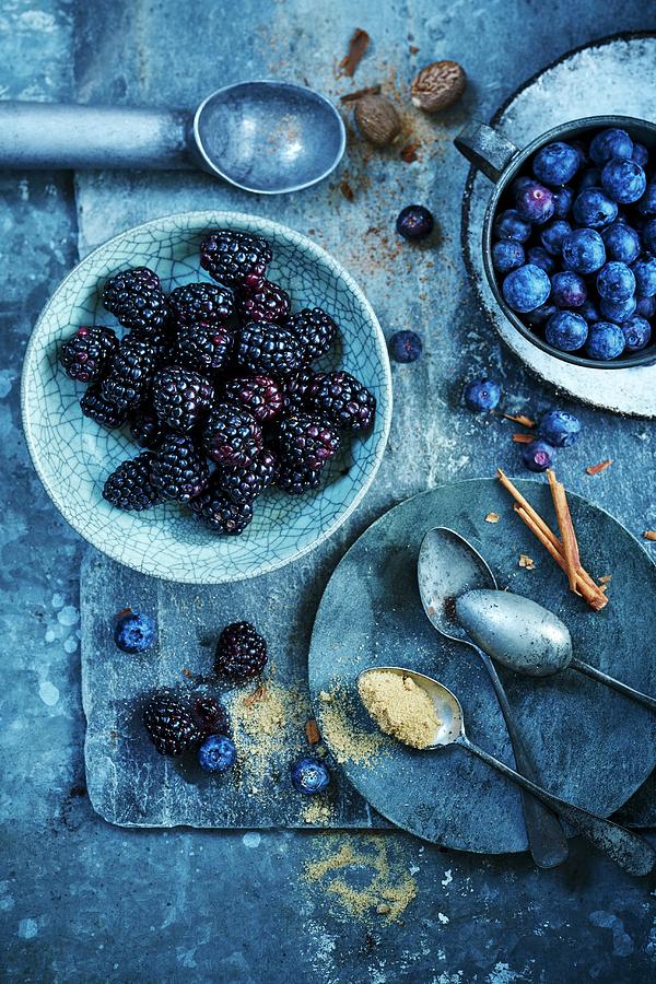 Blackberries, Blueberries, Nutmeg, Cinnamon Sticks And Sugar Photograph by Charlie Richards