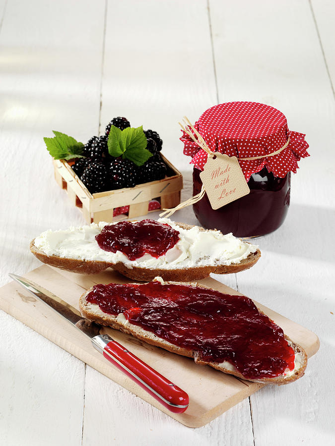 Blackberry Jam On Cream Cheese Bread Photograph by Stockfood Studios / Photoart