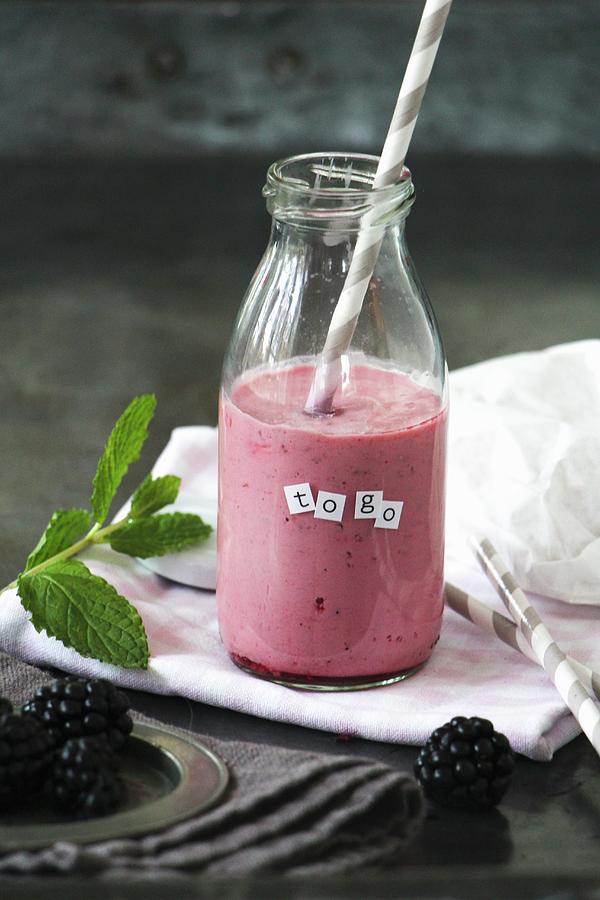 Blackberry Smoothie In A Bottle With Mint And A Straw Photograph by Dees Kche
