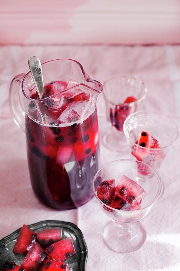 Blackcurrant And Ginger Ale Iced Tea Photograph by Ulrika Ekblom