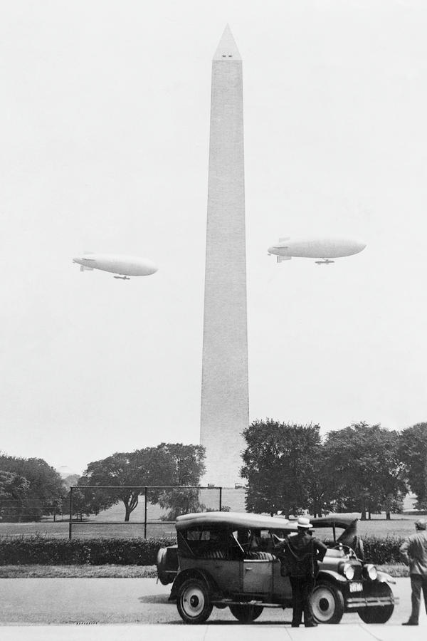 Blimps practice over the Washington Monument Painting by Unknown