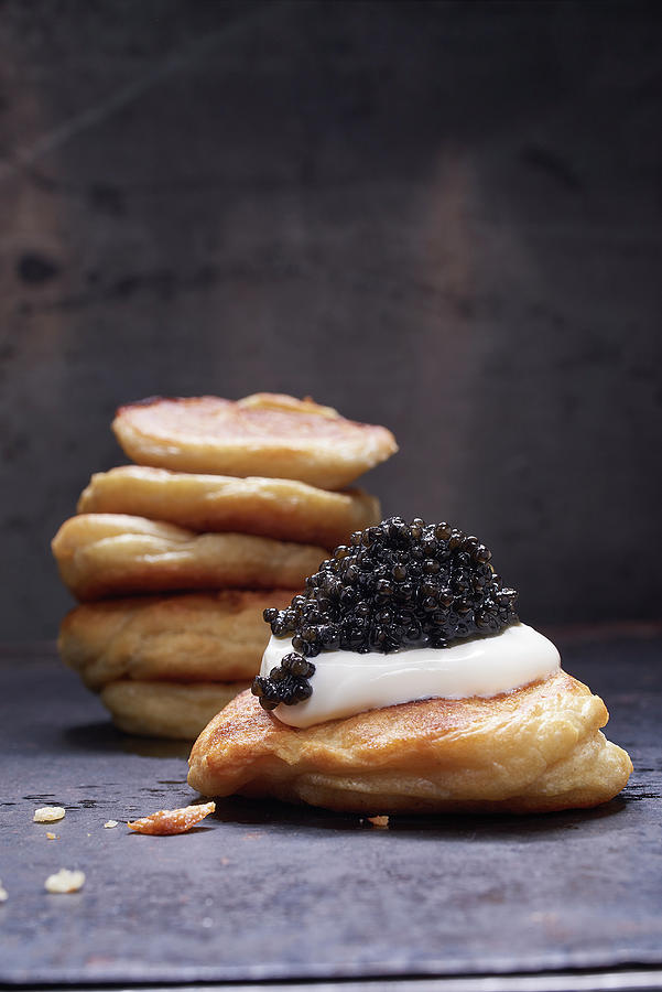 Blinis With Caviar And Crme Frache Photograph by Tre Torri