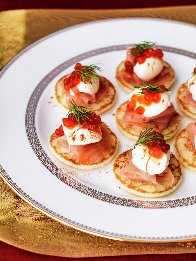 Blinis With Creme Fraiche Smoked Salmon And Salmon Caviar With Red Pepper And Dill Garnish Photograph by Michael Paul