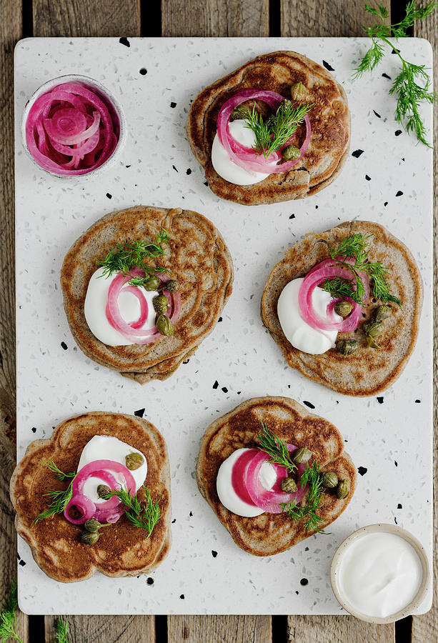 Blinis With Sour Cream And Pickled Onions Photograph by Monika Rosa