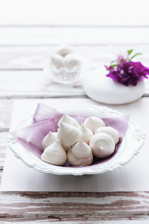 Blobs Of Coffee-flavoured Meringue In A Porcelain Bowl Photograph by Andrew Young